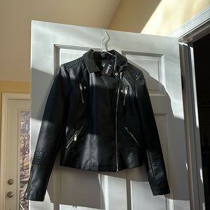 Woman black leather jacket